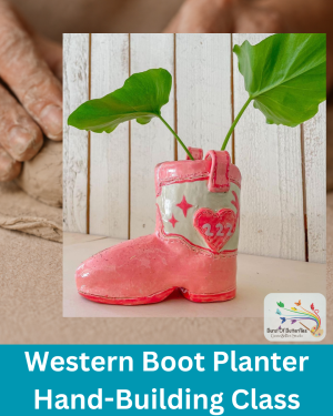 Hand-built western boot planter with glossy pink glaze holding green leaves, featured in a clay hand-building class at Burst of Butterflies in Peoria, Arizona.