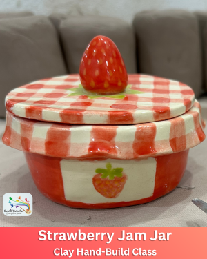 Strawberry jam jar clay hand-building class project with red gingham lid and strawberry knob